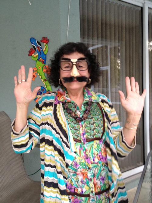 Susan wearing "Groucho glasses" featuring fake nose, eyebrows, and mustache.